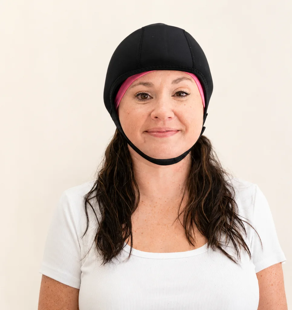 Wishcaps patient placing her own cold cap